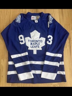 CCM Blue Hockey Jersey with White and Red Tag Accents